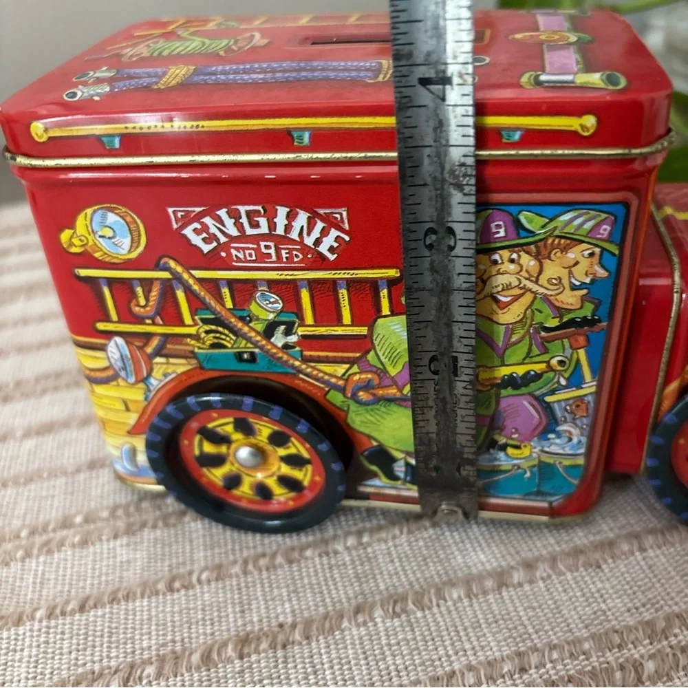 Vintage Fire Truck Bank- from part comes Off main- Actually rolls around.